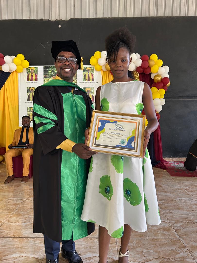 Berger student receiving a certificate
